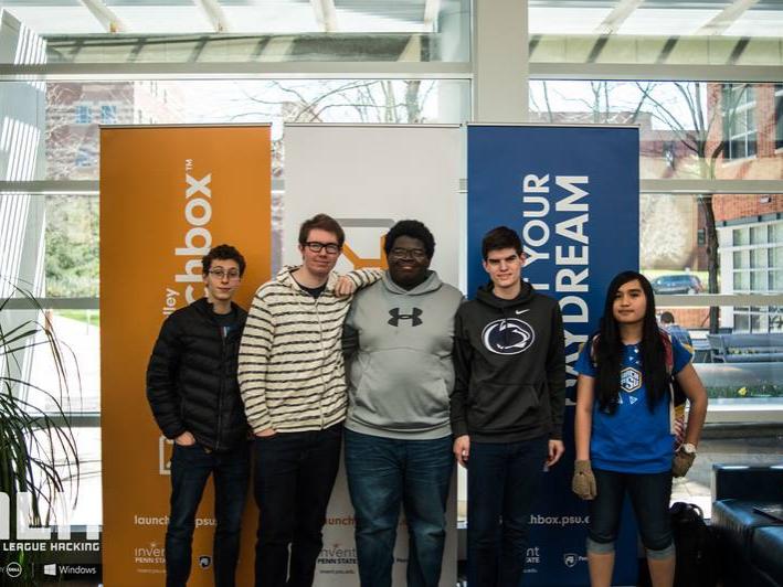 students standing in front of banners