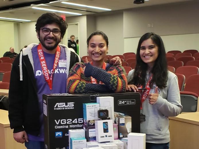 Three Penn State Great Valley data analytics students at West Chester Unviersity's hackathon