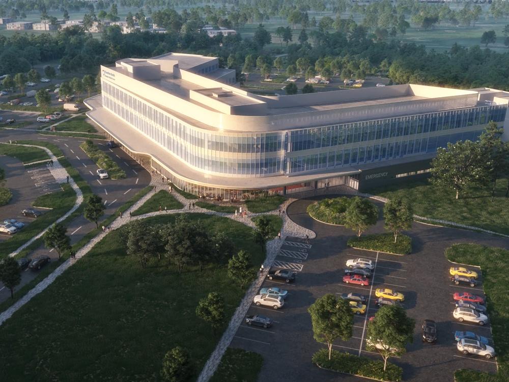An aerial view artist's rendering of a future three-story hospital