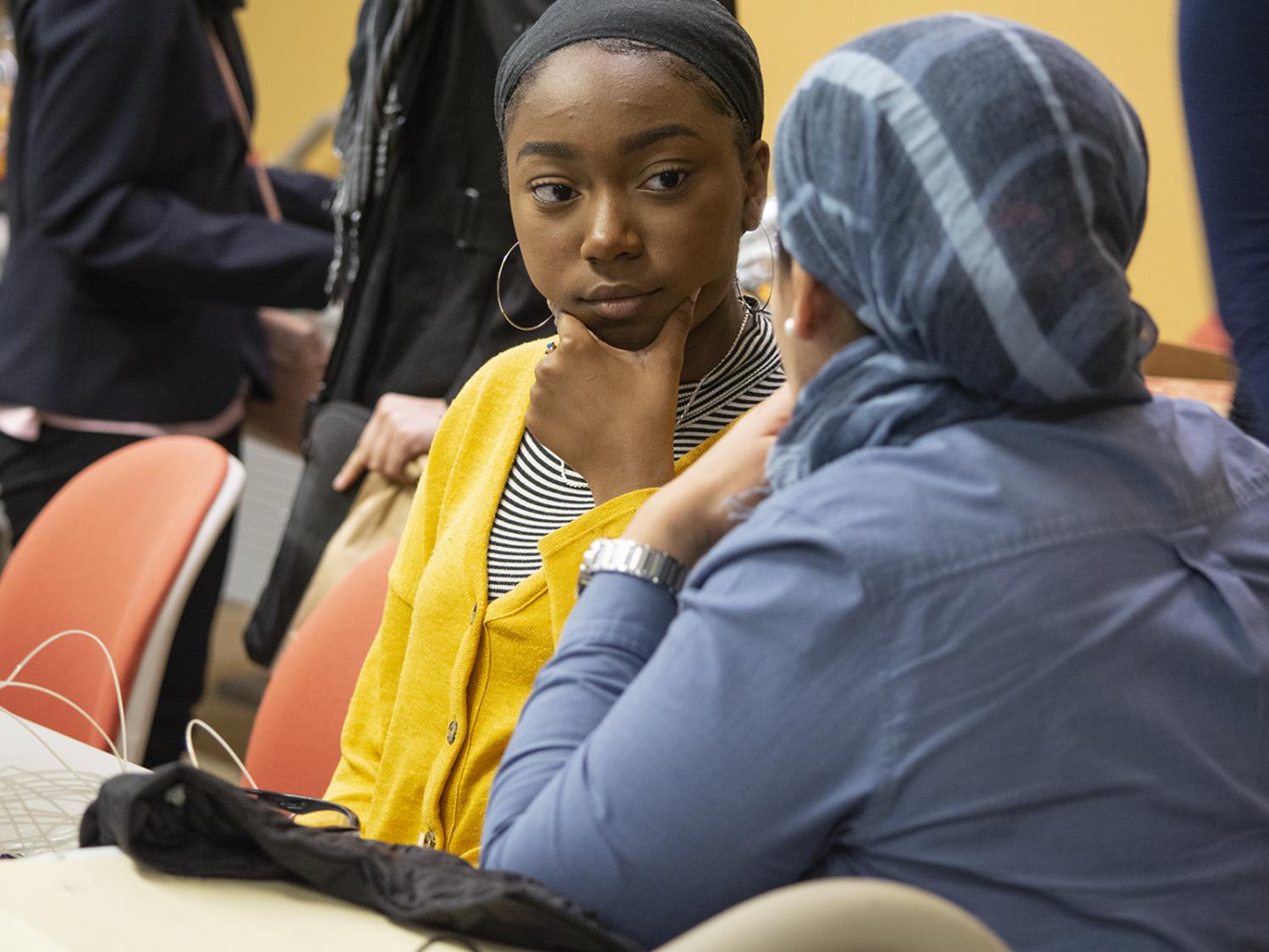 Faculty mentor, Ola Rashwan, speaks with high school student Zimirah Wilson at an EnvironMentors meeting in Harrisburg, Pennsylvania.