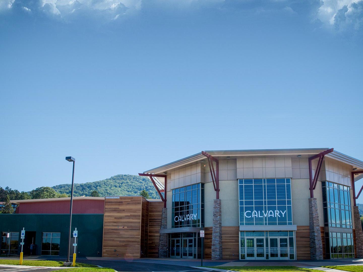 A church building is seen on a sunny day. 