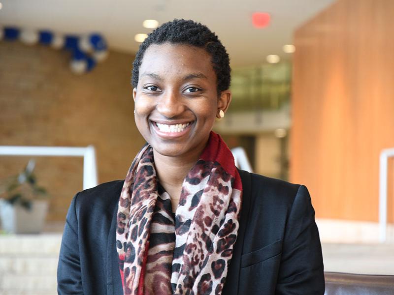 Heidi Foon poses for photo in Katz building