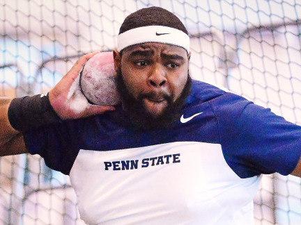 Penn State field athlete Darrell Hill readies for a shotput throw