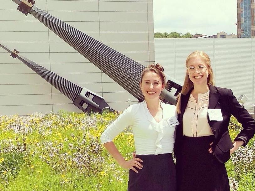 Two students on a green roof.