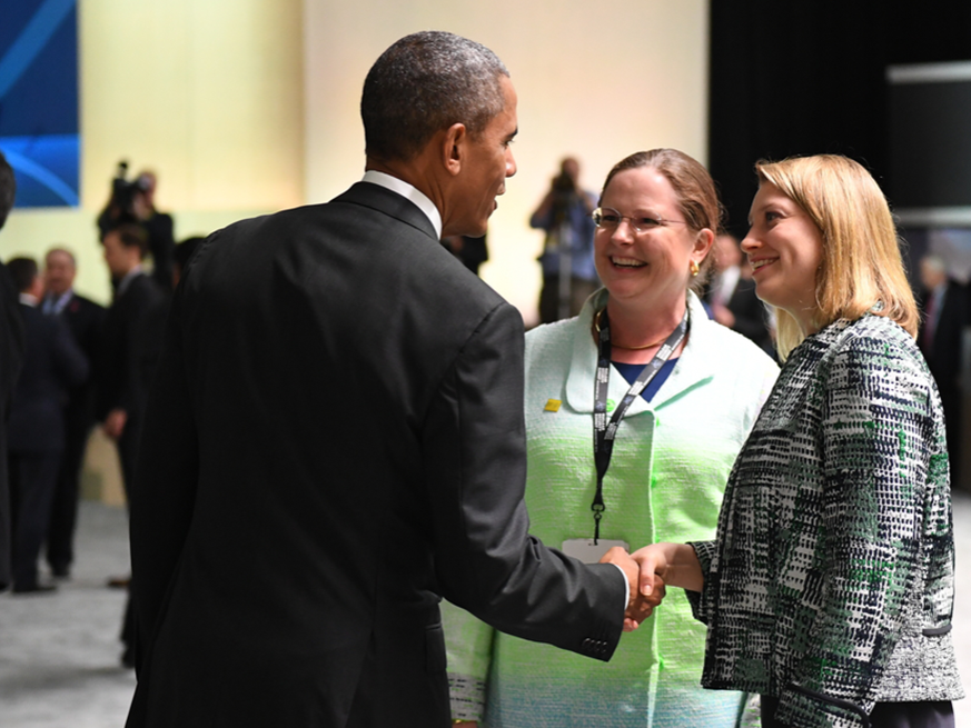 President Obama talks to two of his advisors, Laura Holgate (center) and Corey Hinderstein, at the Nuclear Security Summit Plenary 1. C