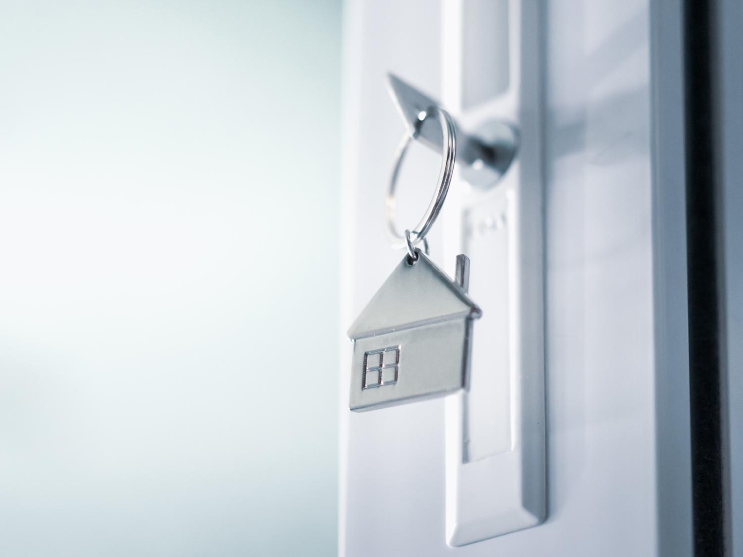 house shaped key in door