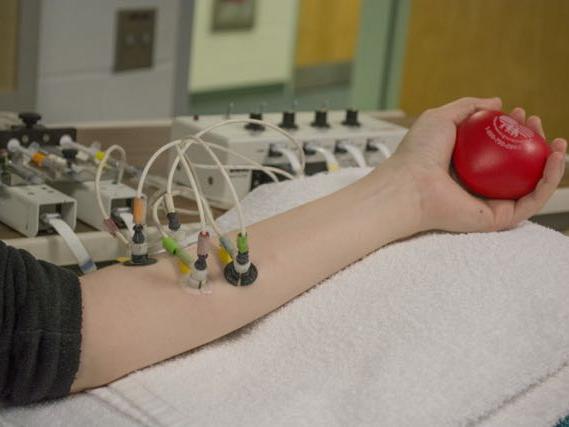 wires attached to an arm
