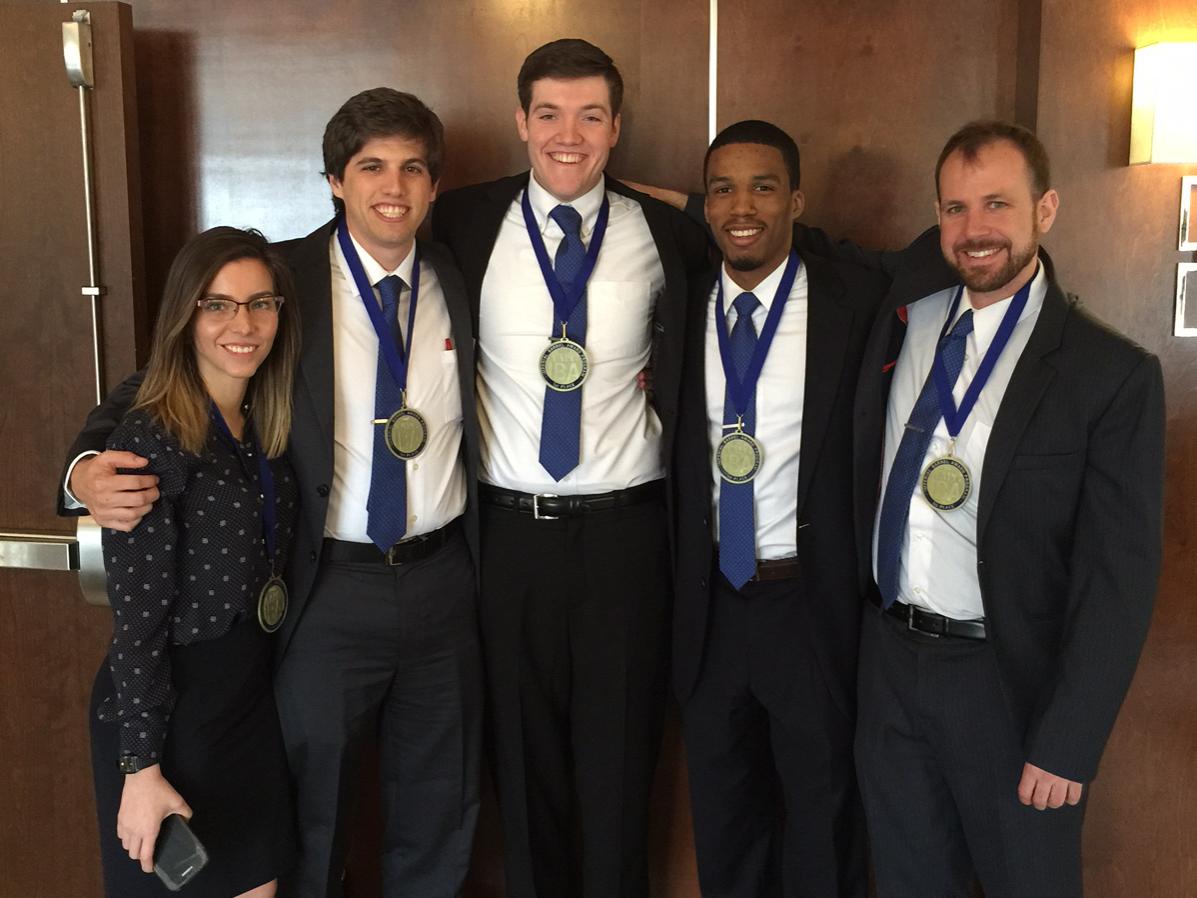 Five Penn State graduate students pose for a picture after winning first place in the regional Imperial Barrel Award competition.