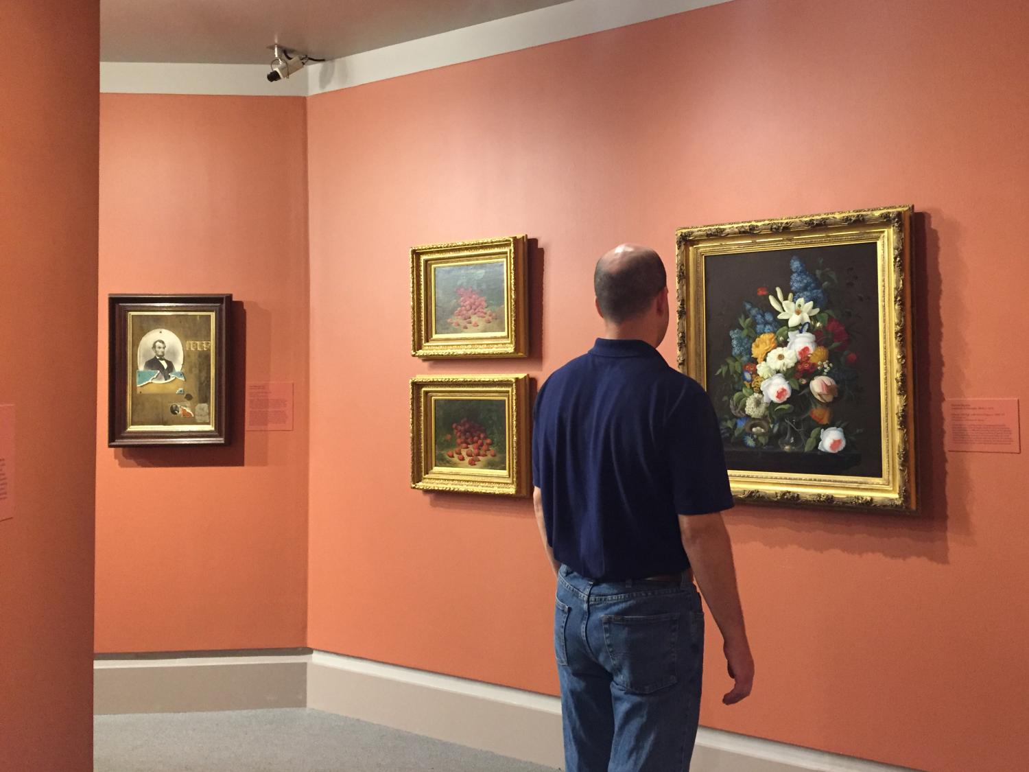 A visitor to "Object Lessons"