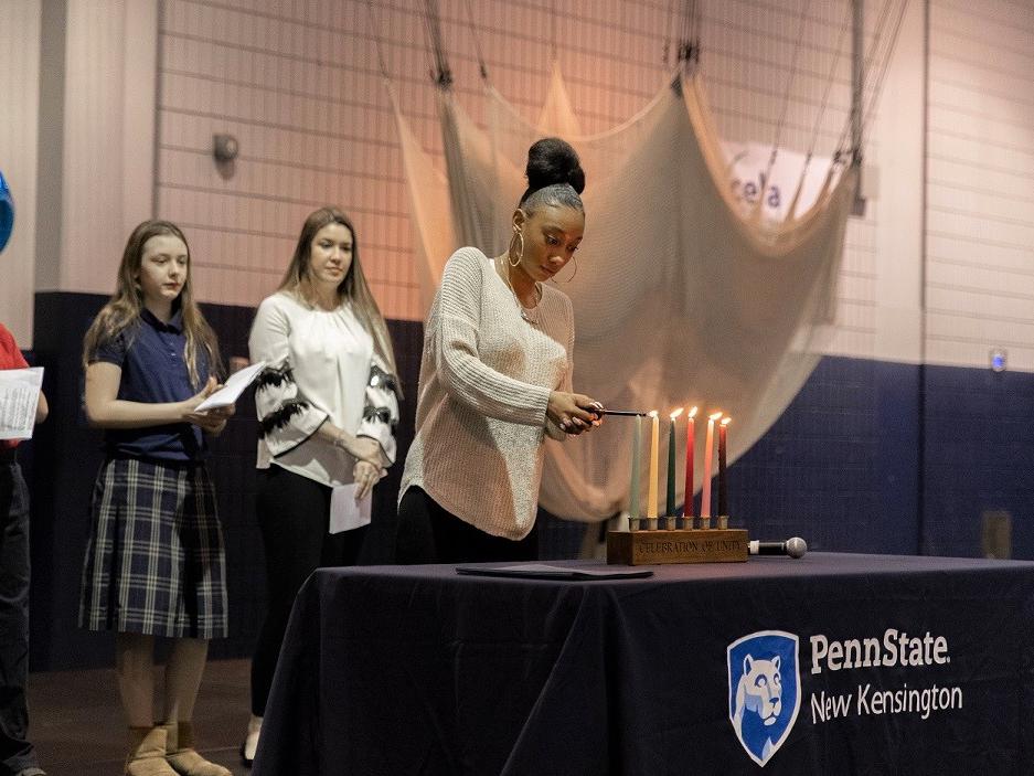 Female lights unity candle