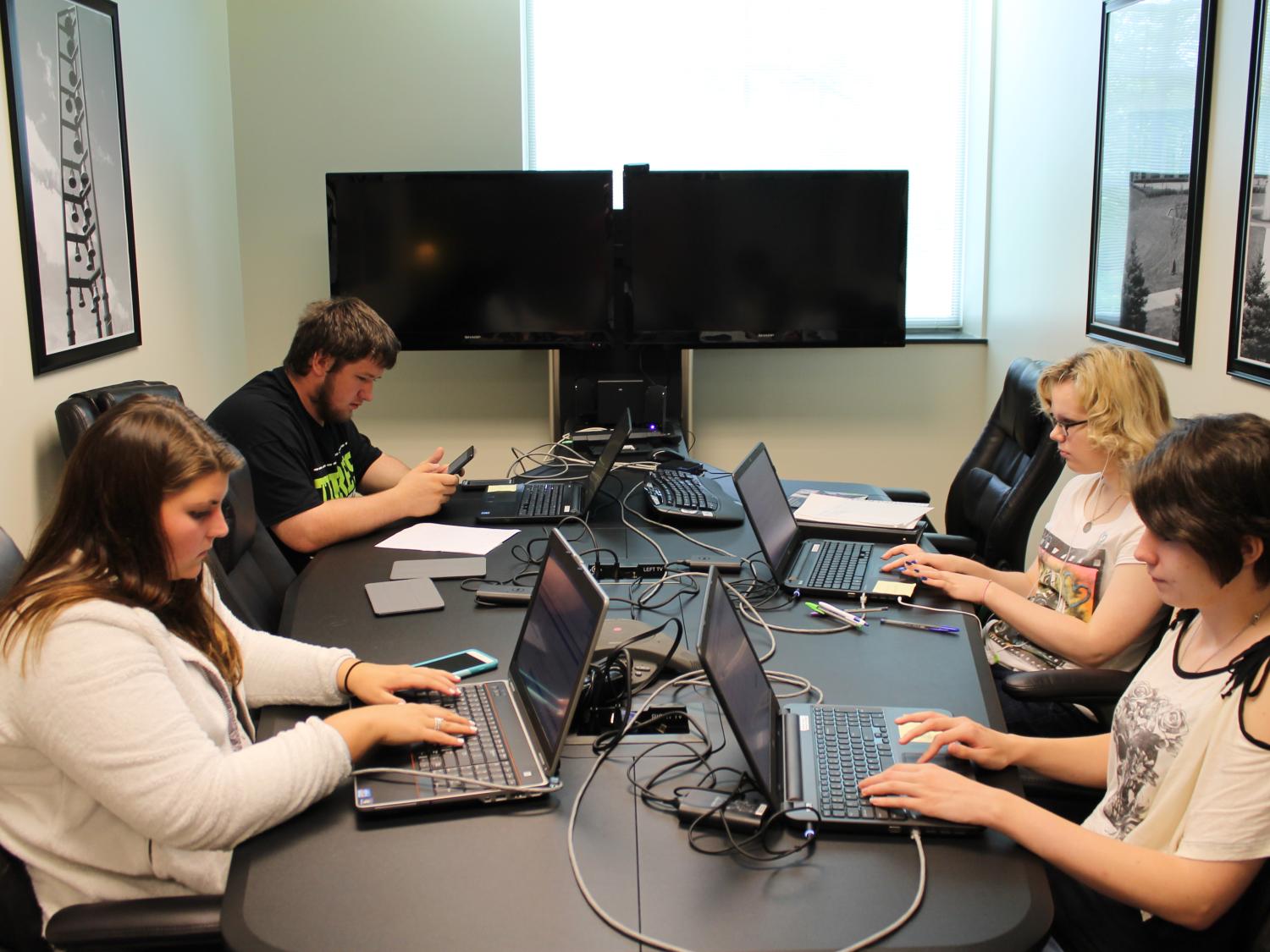 students working on making faculty course content accessible
