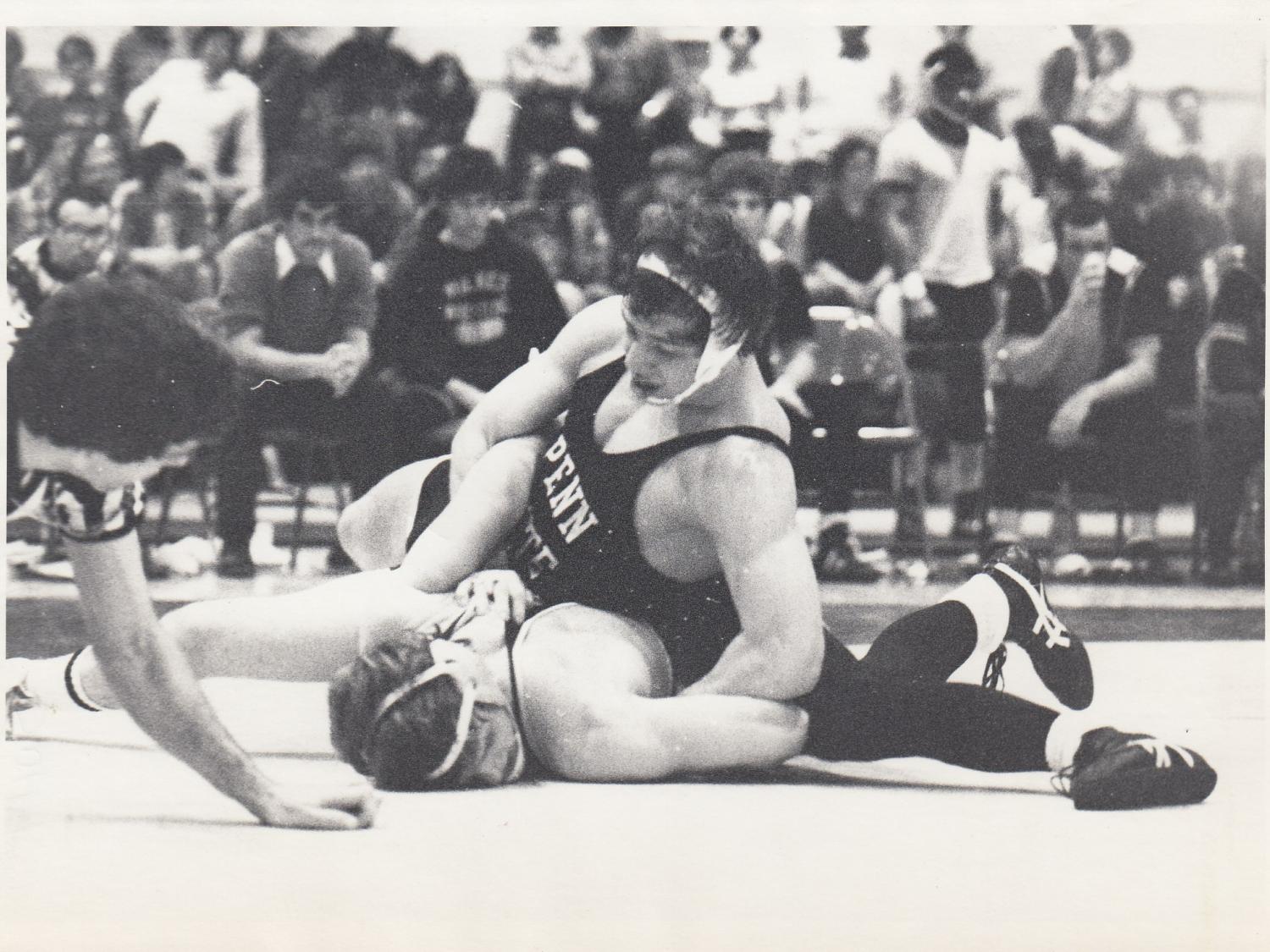 An archival photo of wrestlers at Penn State Behrend