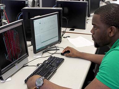Tobi Jewoola working on Senior Thesis
