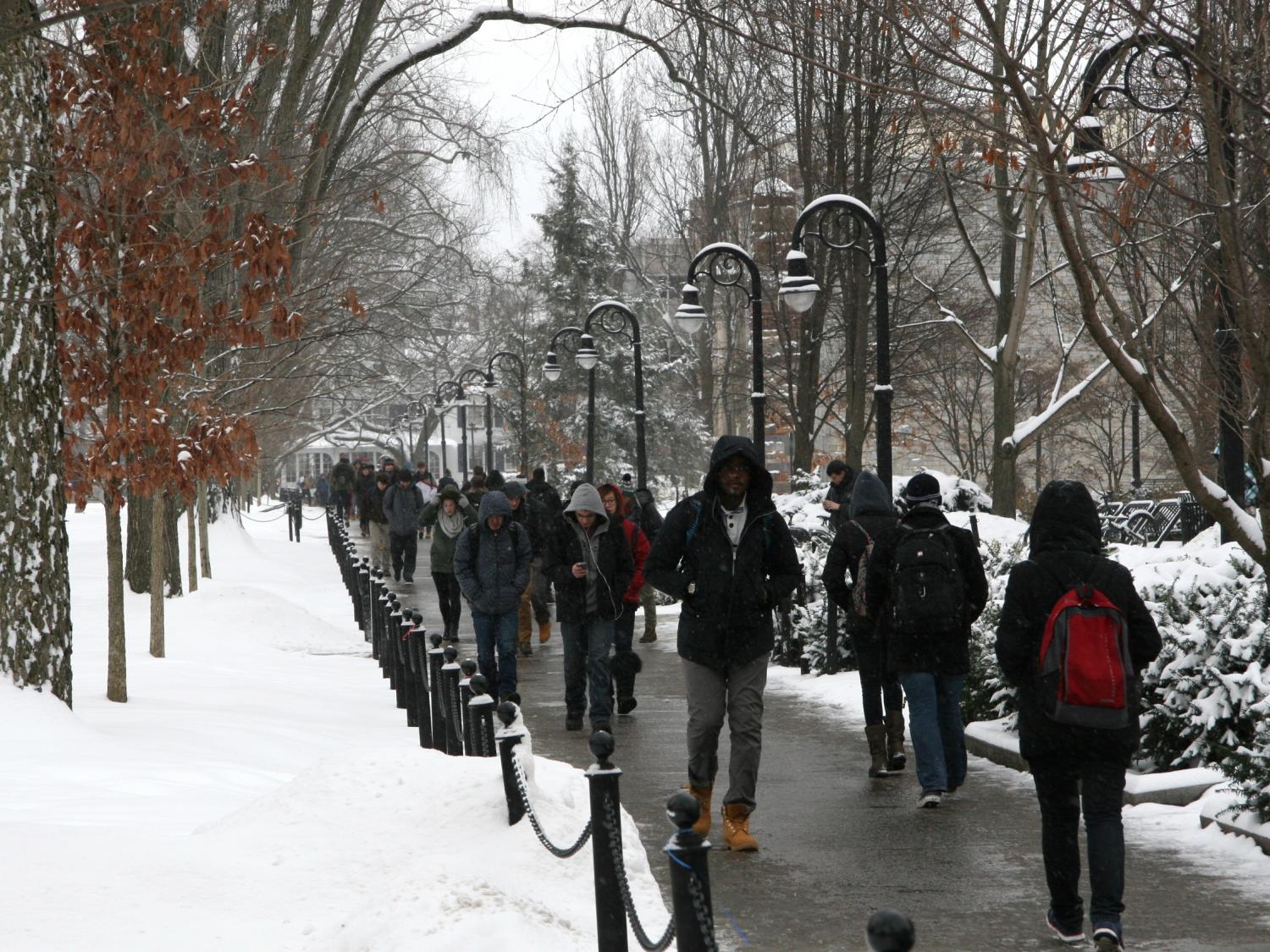 Students head to and from class during Monday's snow event.