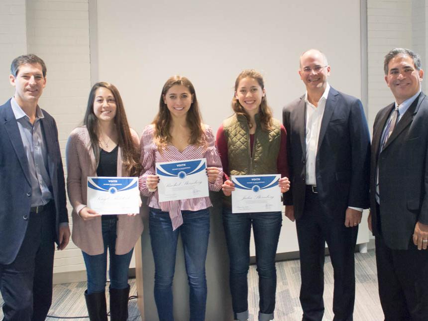 Voith executives and students. 