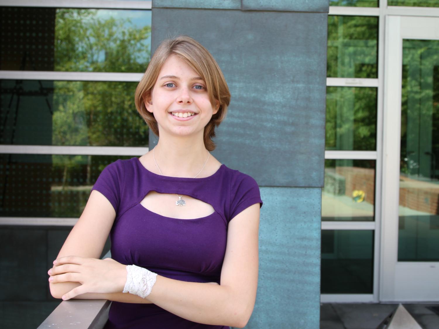 Lily McCullough in front of the Stuckeman Family Building