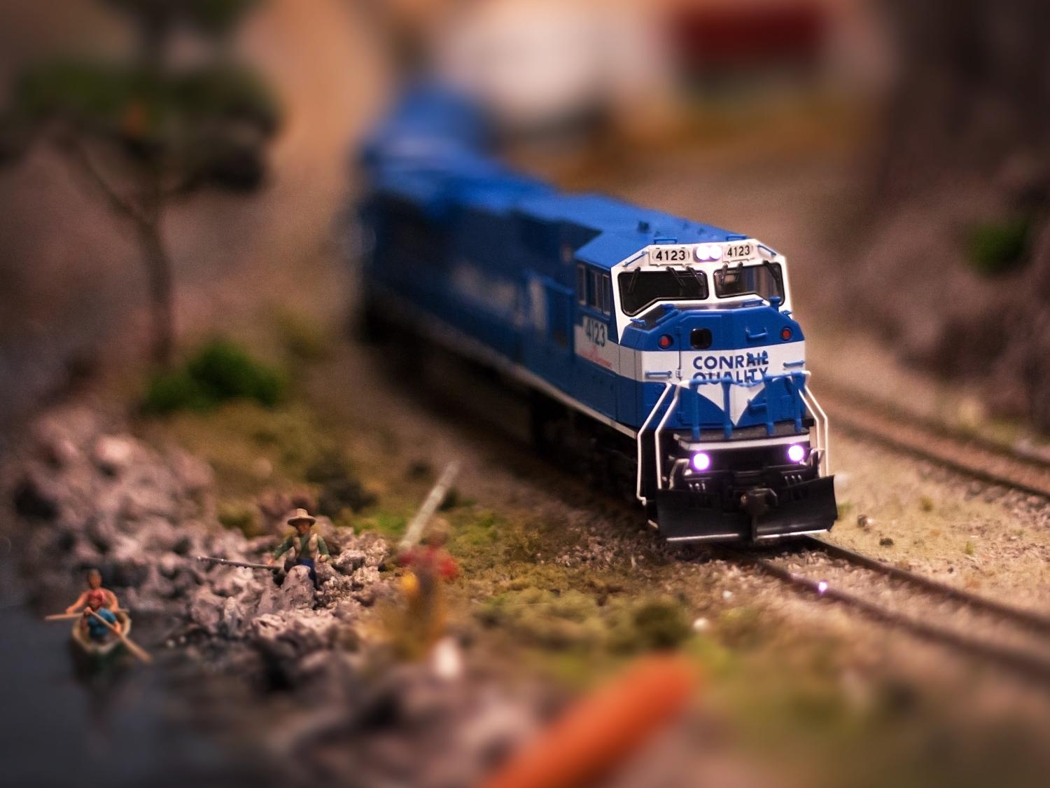 A model train goes down the track