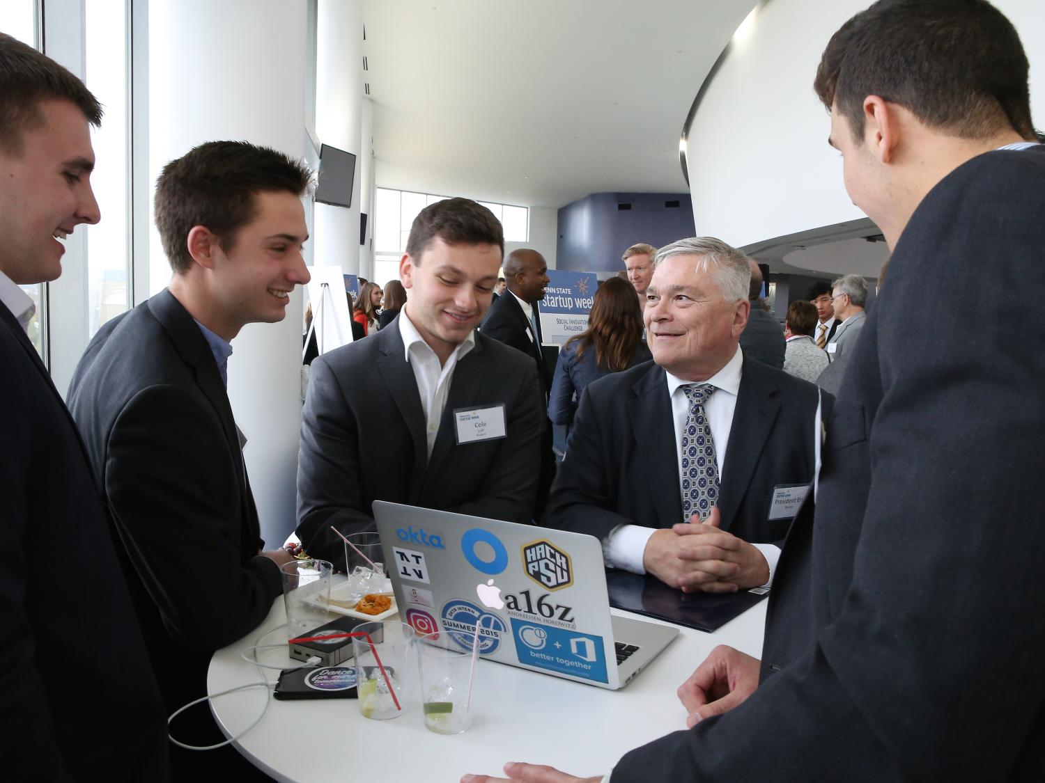 Dr. Eric Barron speaks with students who've won Penn State Startup Week pitch competitions.