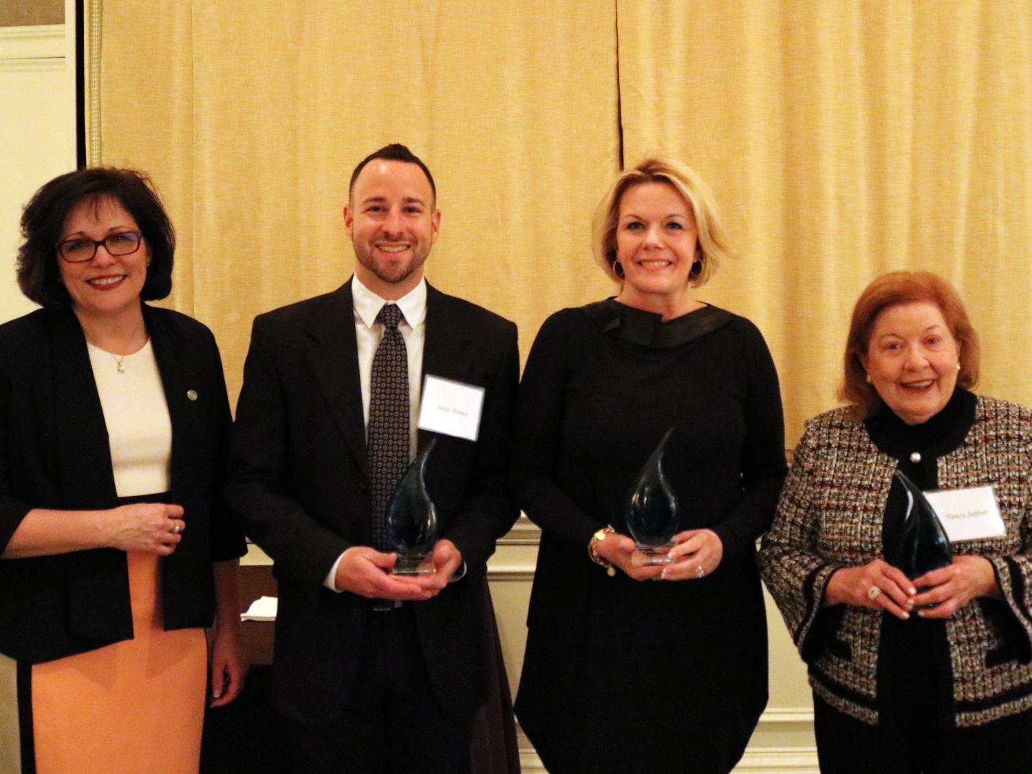 Honorees standing next to Chancellor Jacquline Edmondson