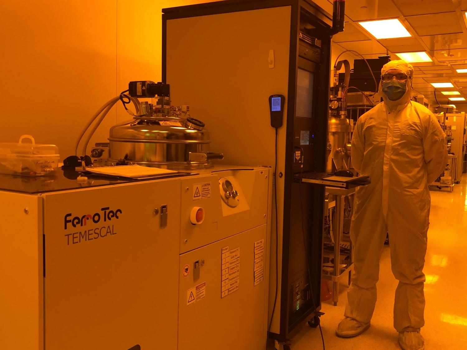 Alex Molina, Penn State graduate student, stands in a laboratory