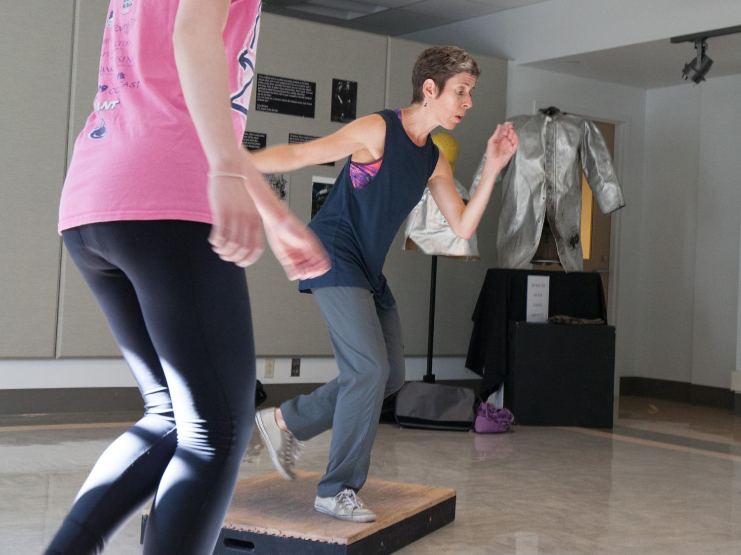 Student follows Dunleavy's movements.