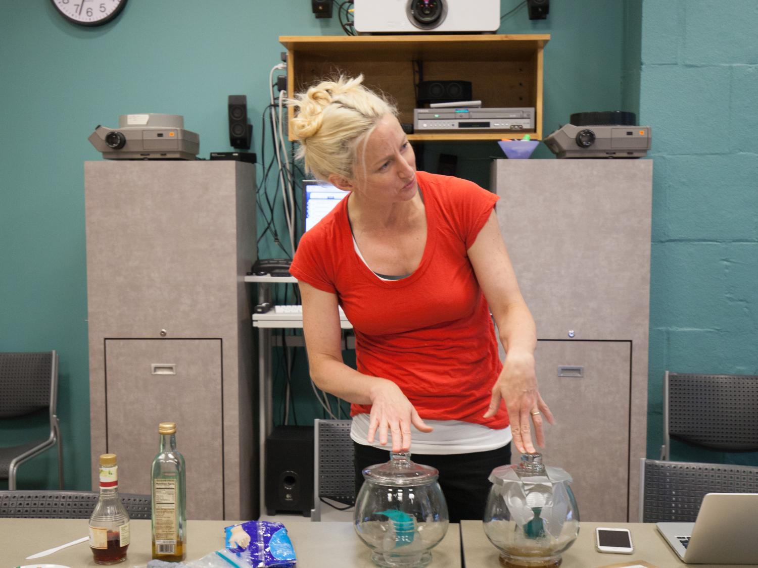 Sarah Rich presents the copper reactions to her seminar following an experiment. 