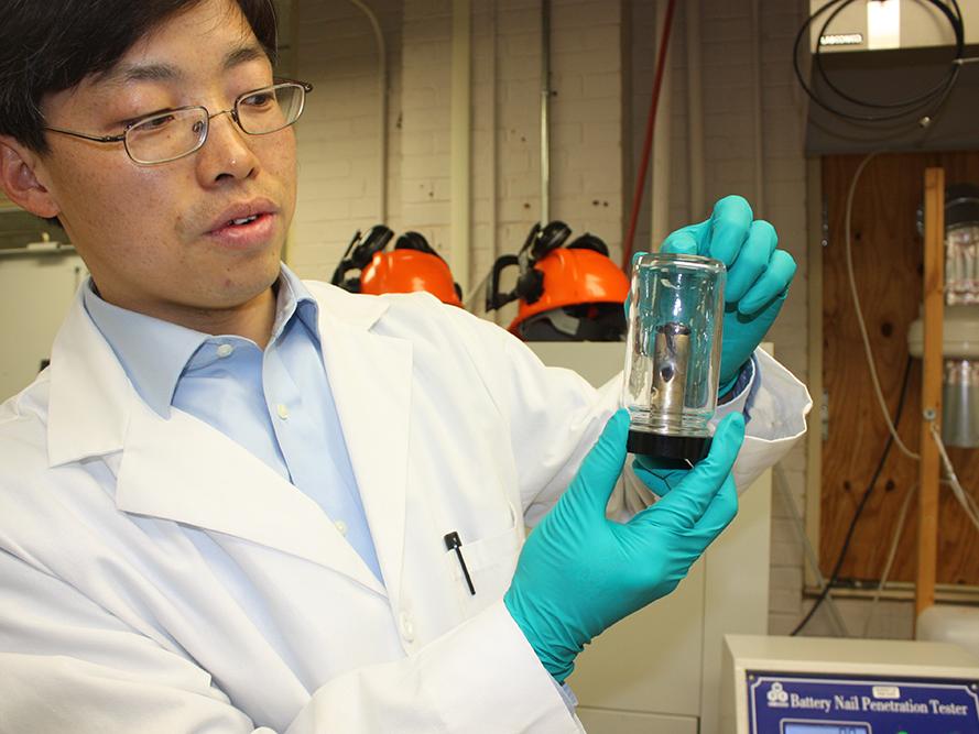 Guangsheng Zhang Showing a punctured battery
