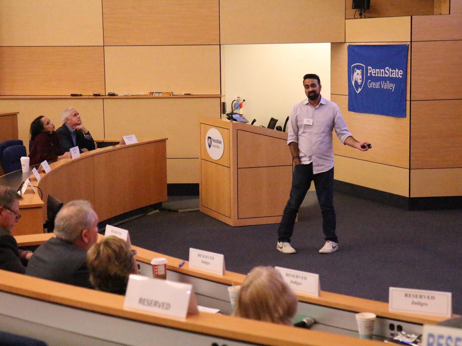Raghav Hardas pitches his app, Squawkr, to a panel of judges at Penn State Great Valley's Lion Cage competition