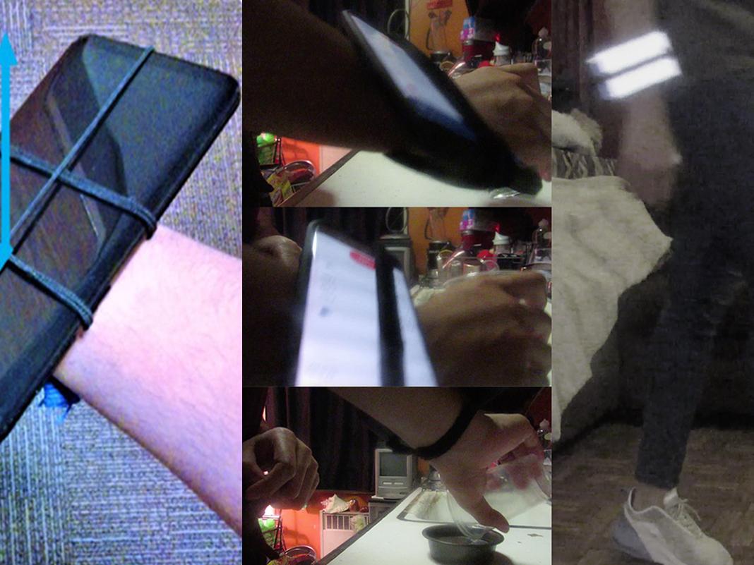 A smartphone is strapped to a person's wrist to measure movement. 
