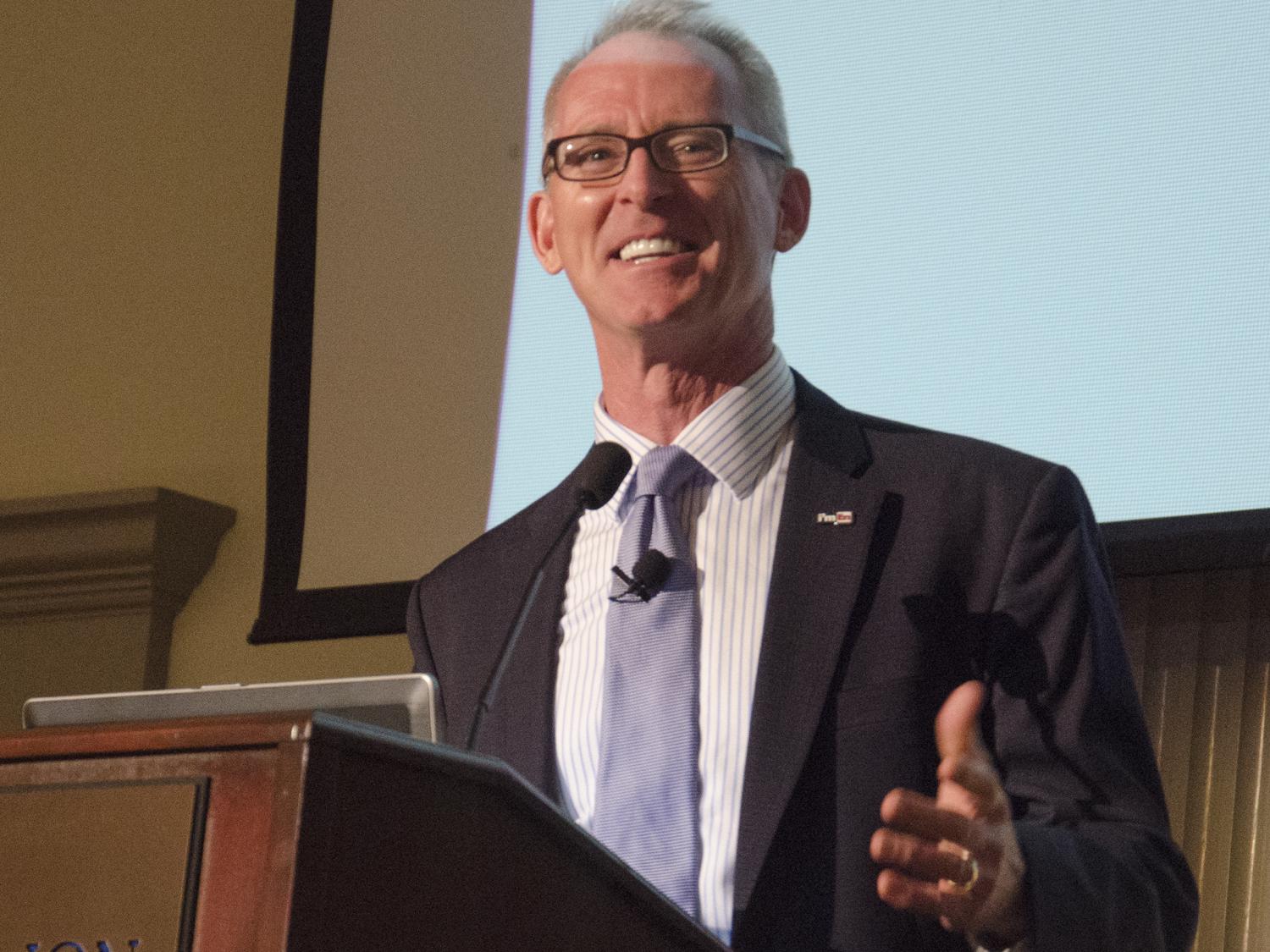 Bob Inglis speaking at a podium 