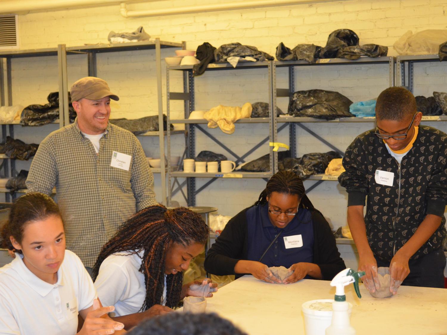 Christian Kuharik talks with Farrell High School students during first night of the HopeCAT pilot program.
