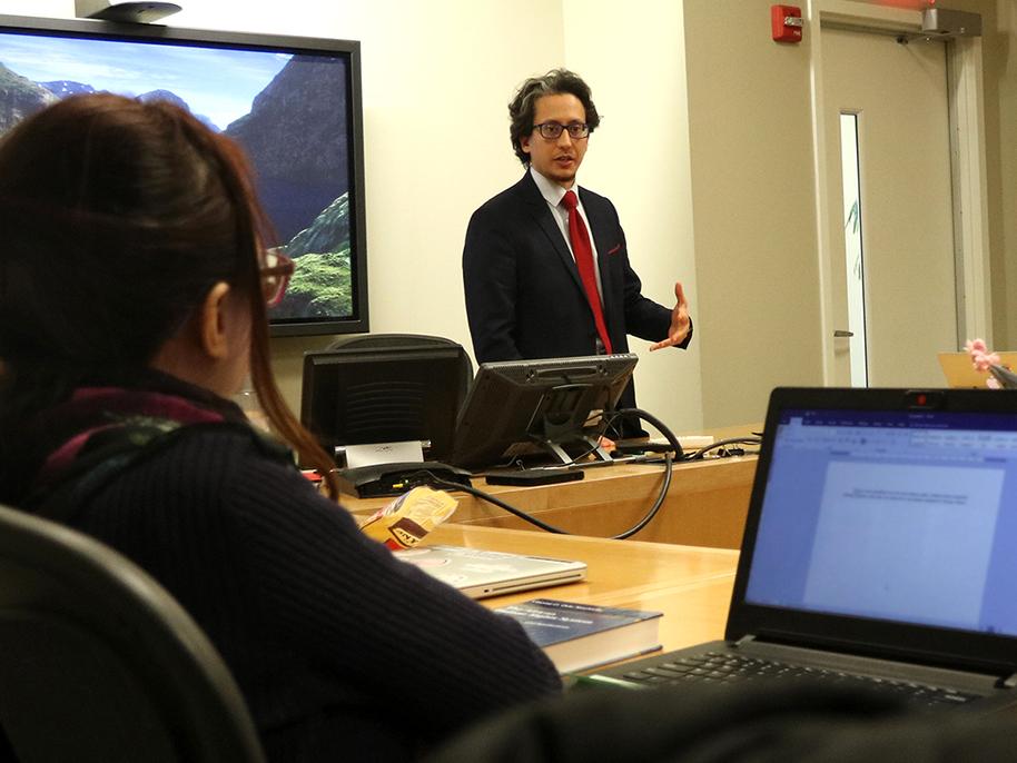 Iyadh Abid speaks during a class on human rights at Penn State Law