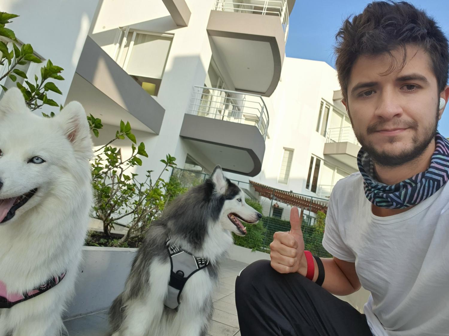 A picture of Penn State alumnus Jacob Hidrowoh with his dog