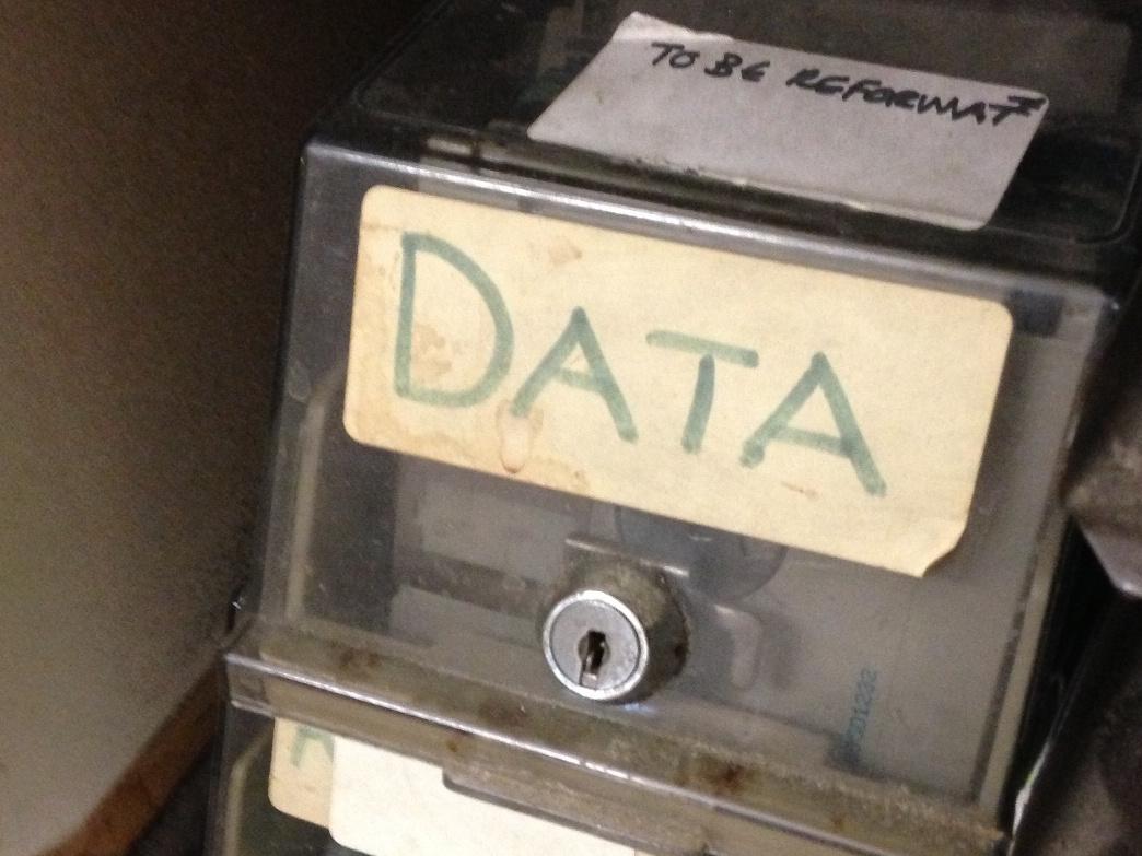 photo of old floppy disk drive labeled with the word 'data'