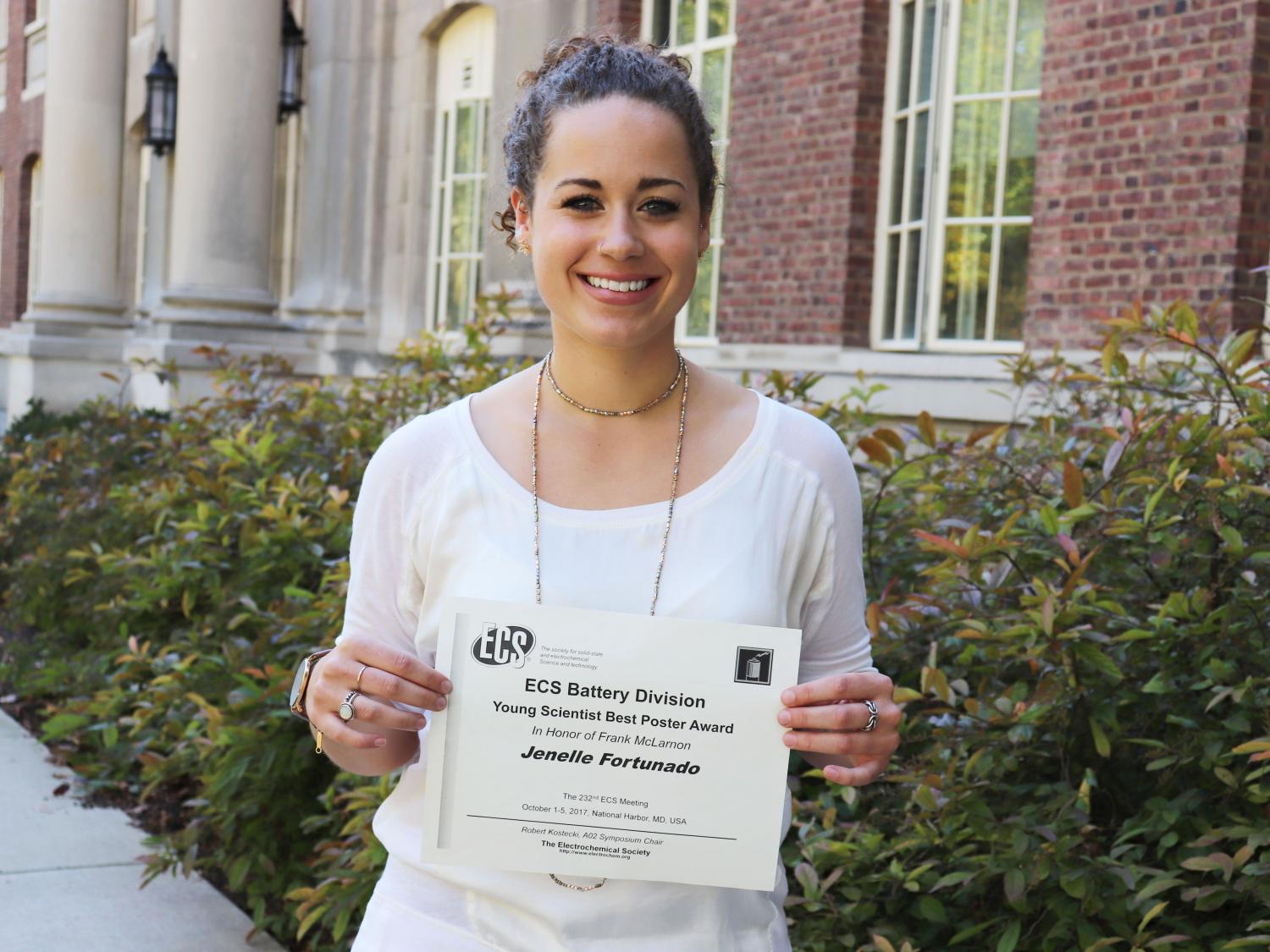 Jenelle Fortunato poses with award