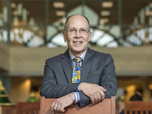 Penn State Laureate John Champagne