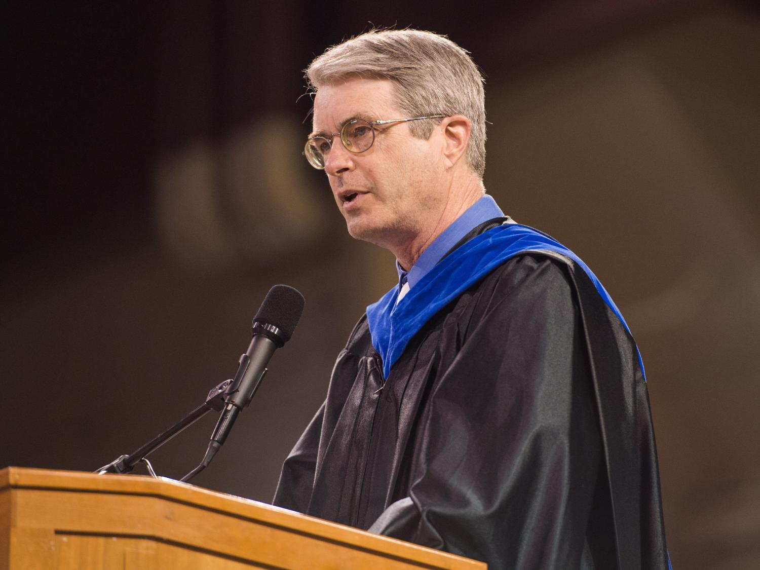 Penn State Behrend professor Jonathan Hall speaks during a commencement program.