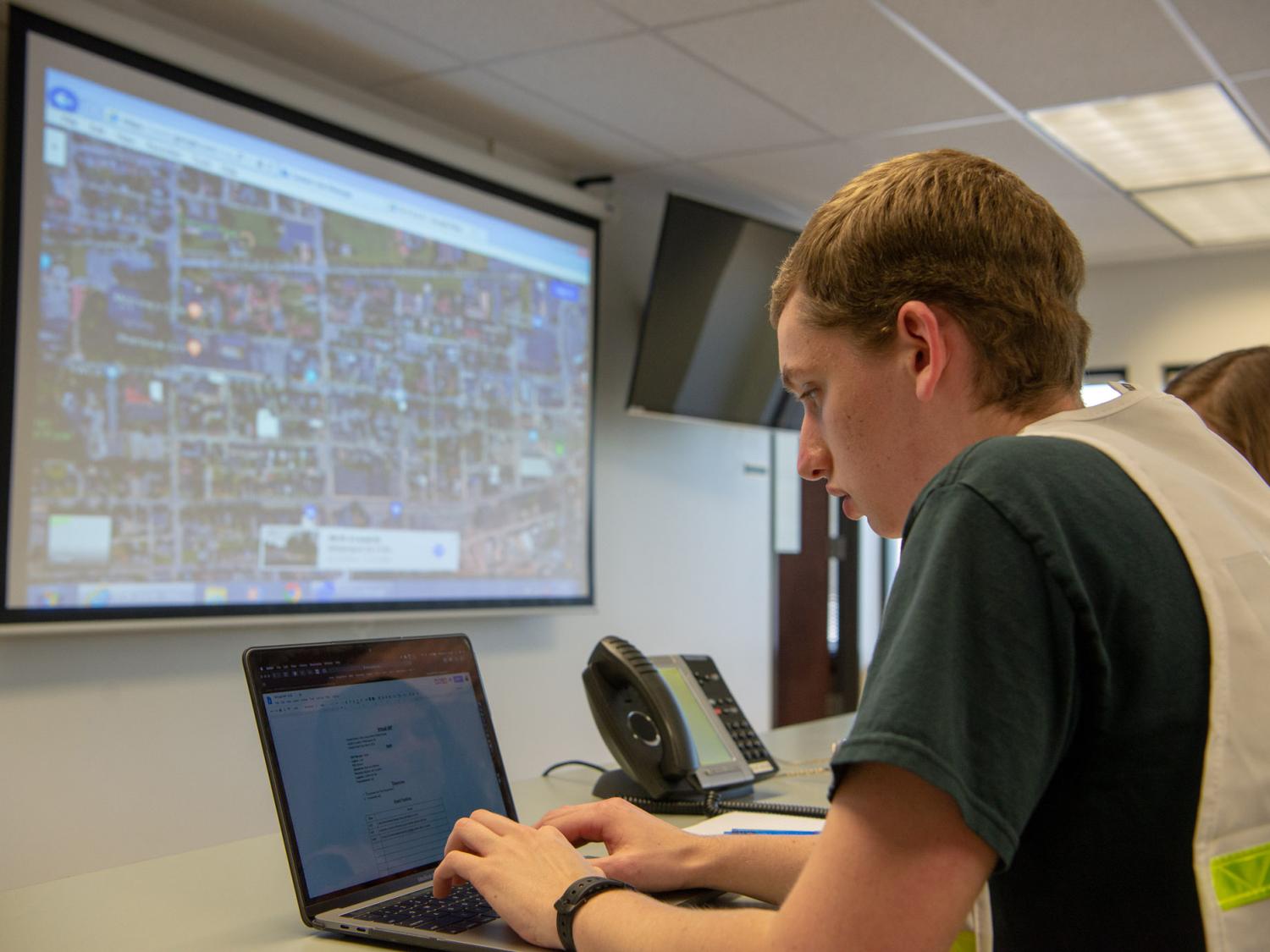 Joshua Walter at a computer screen