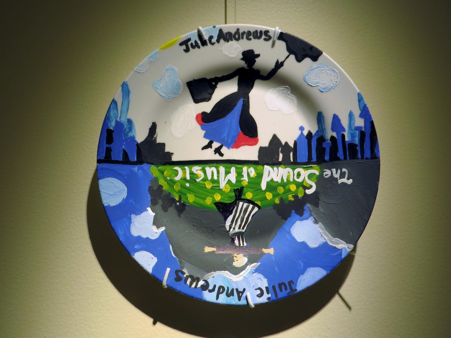 A dinner plate painted to honor the actress Julie Andrews.