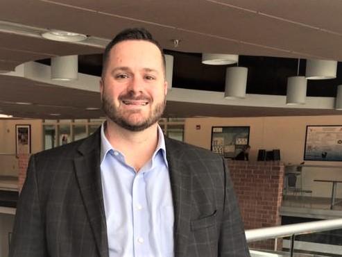 A portrait of Penn State Behrend alumnus Justin R. Bloyd