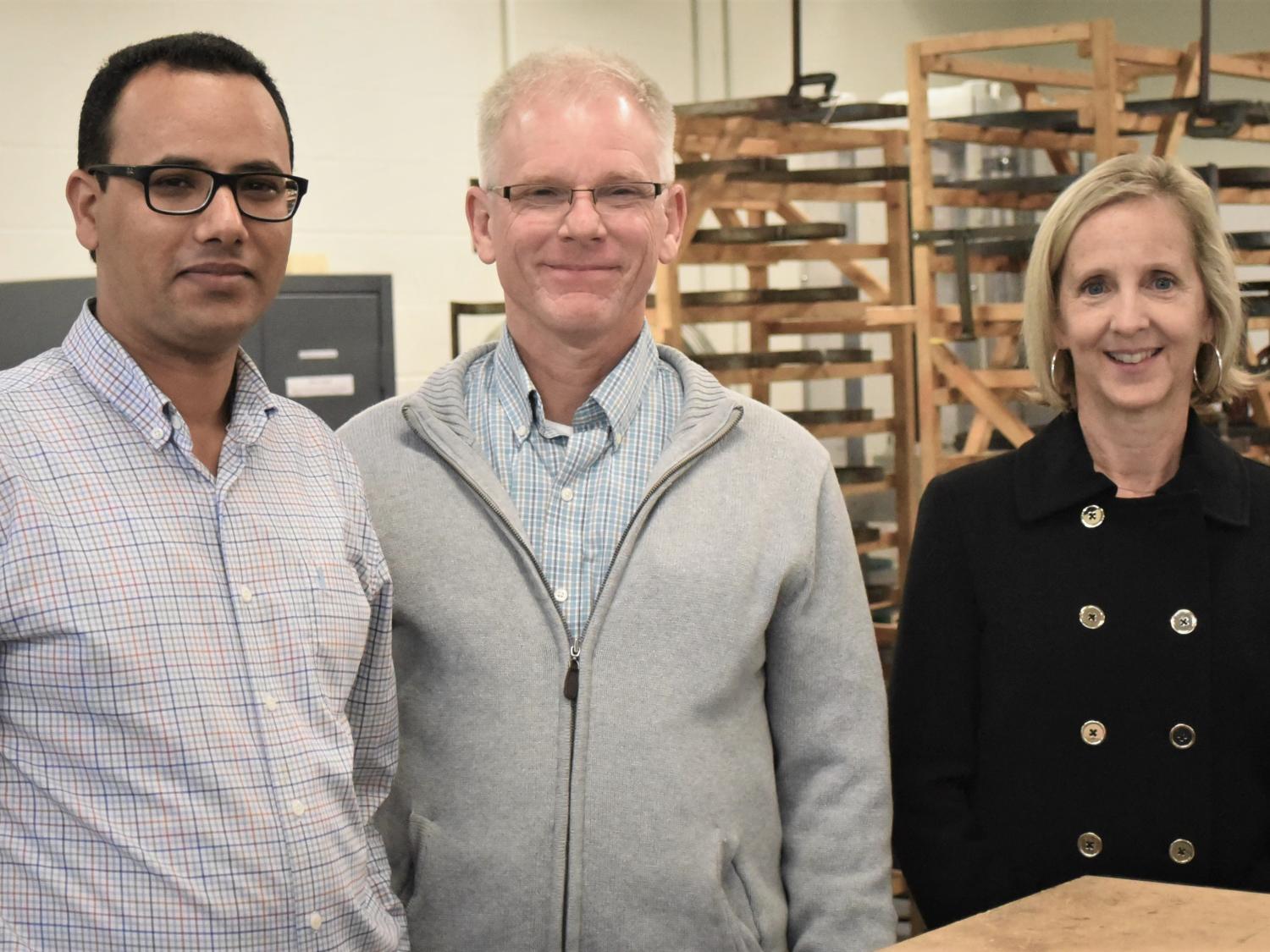 Members of a new Kaizen organizational team pose in the materials lab at Penn State Behrend.