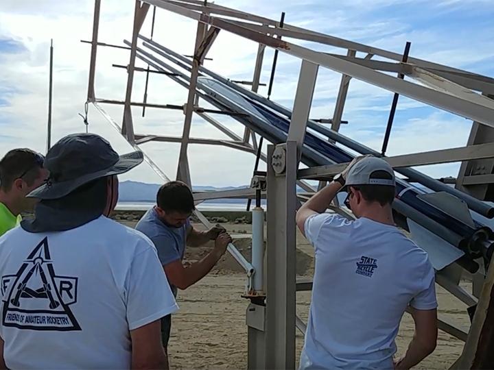 Odhner and his fellow engineers prepare to launch their rocket.