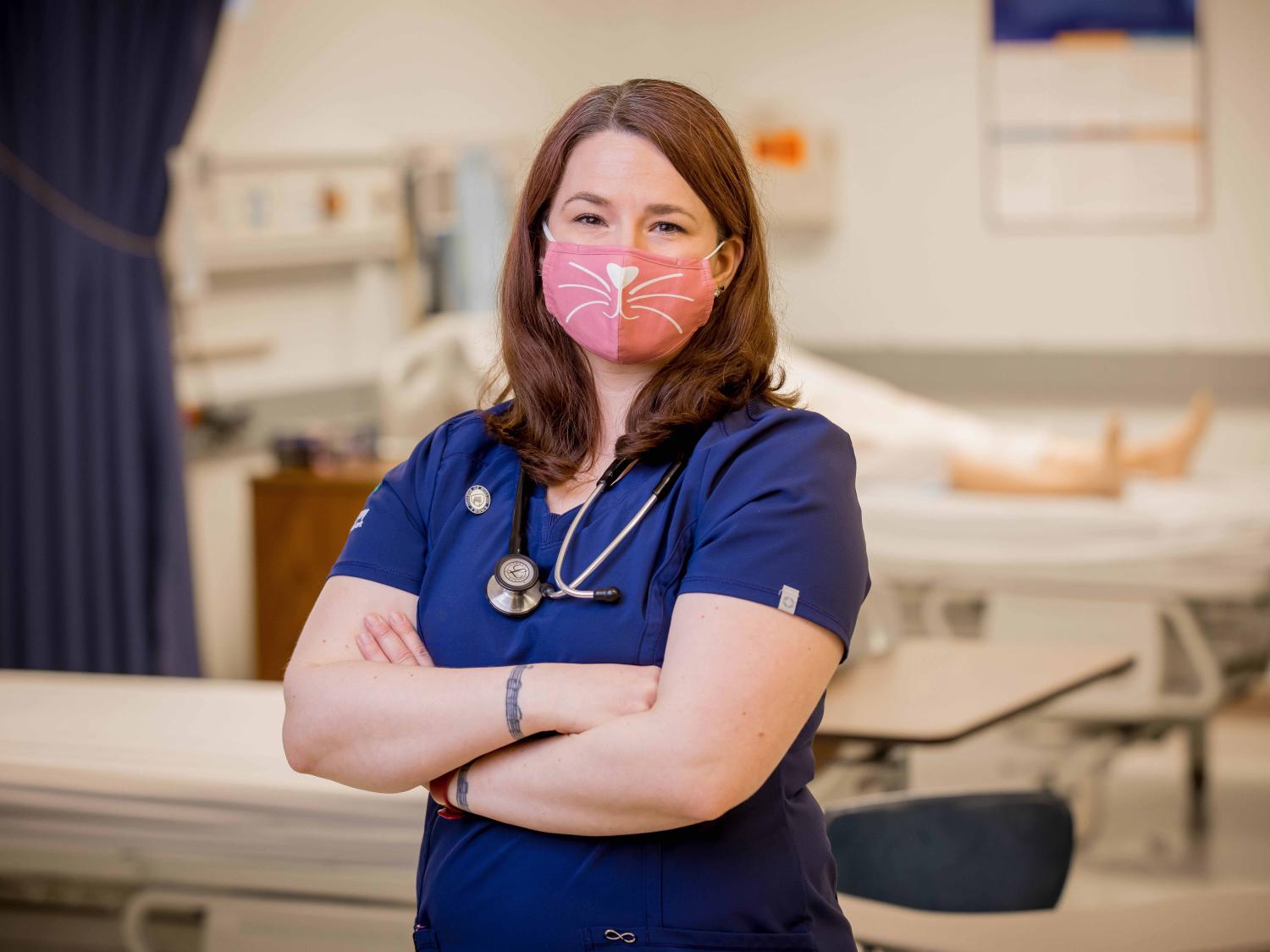 Penn State Behrend alumna Katie Woodworth poses in the college's nursing simulation lab.