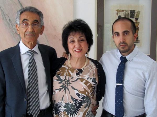 Dr. Vali Kermani, Mrs. Pari Kermani and Kia Kermani pose for a photo, standing side by side.