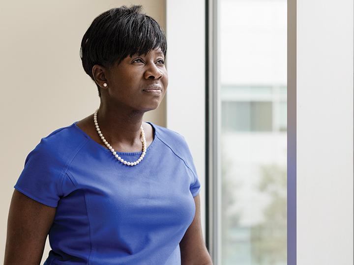 Dr. Kesha Morant Williams stands by a window at the Penn State Health St. Joseph location
