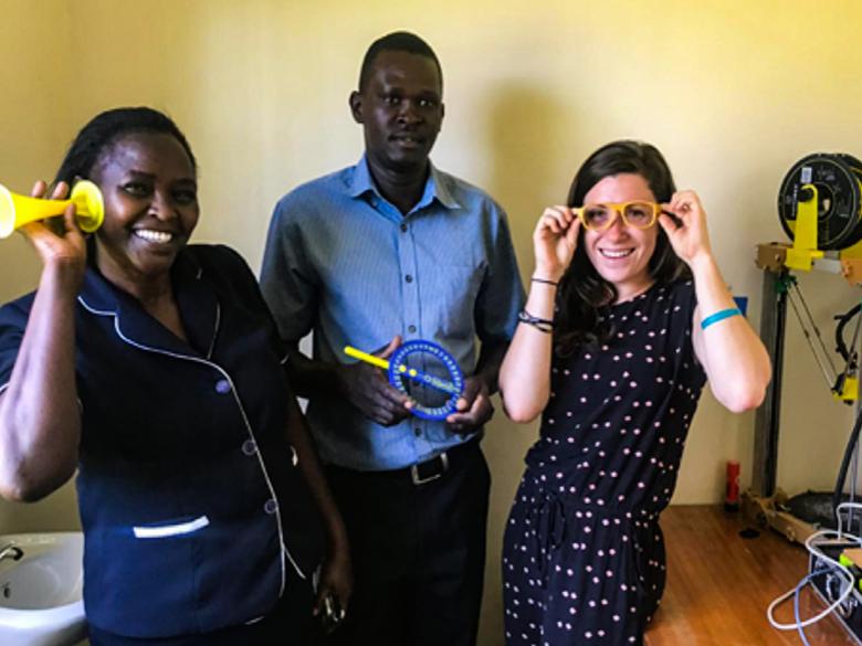 Alenna Beroza, Kijenzi engineer, shows off some Kijenzi parts designed with and for nurse/administrator Jennifer Simani and biomedical engineer Daniel Obego. Alenna has spent the last four months working in Kombewa District Hospital, co-developing and testing parts with local professionals and Kijenzi engineers in the US.