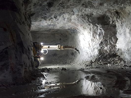 Mining equipment is operated in a large-opening mine