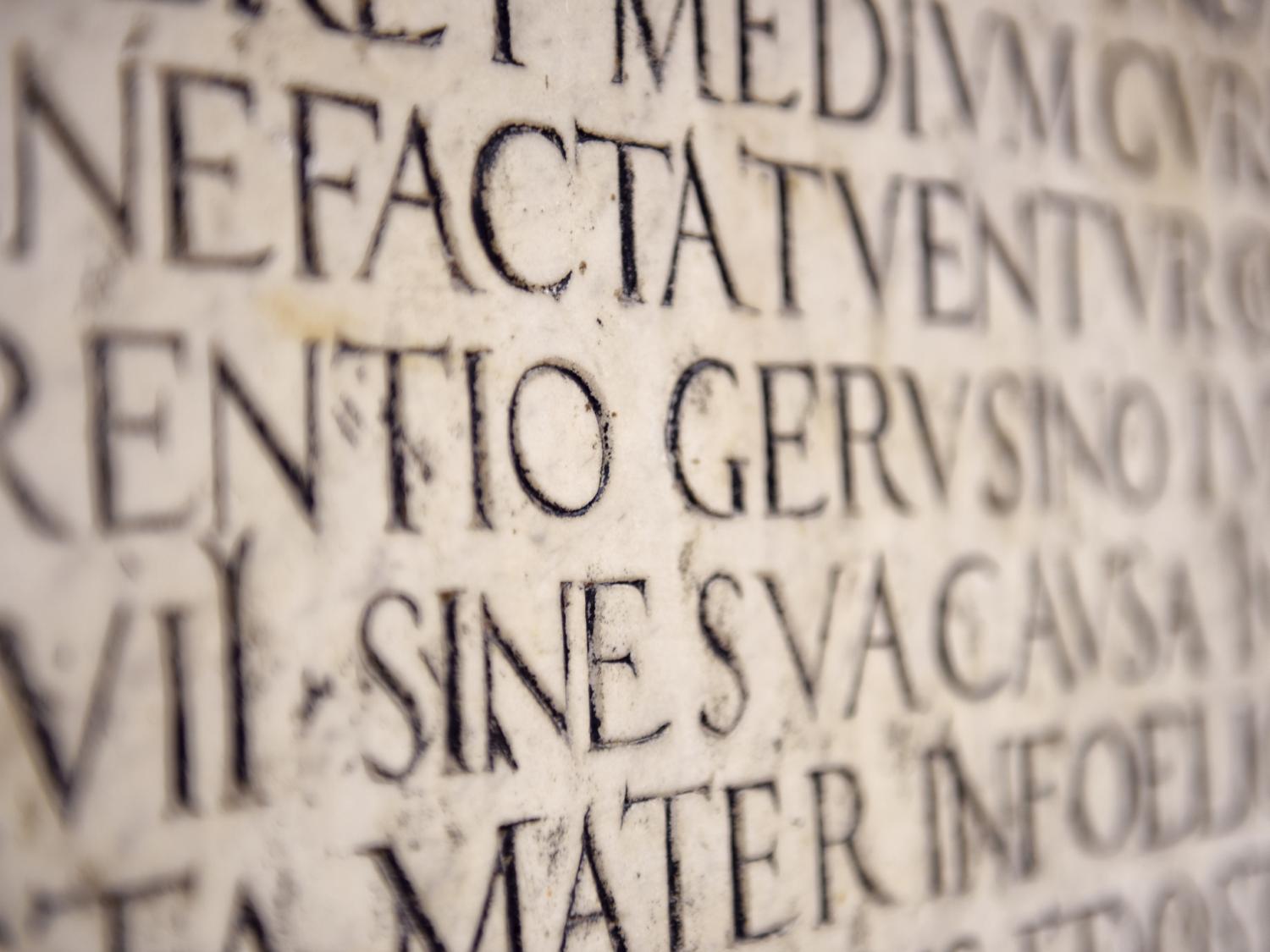 Latin words engraved in stone