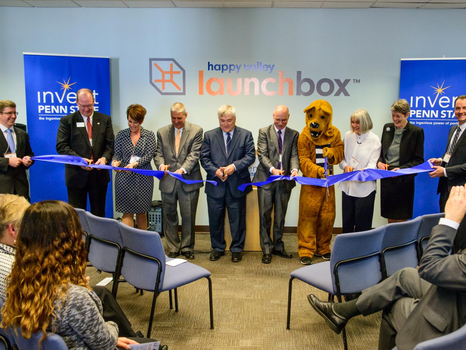 President Barron and guests do ceremonial ribbon cutting for Happy Valley LaunchBox