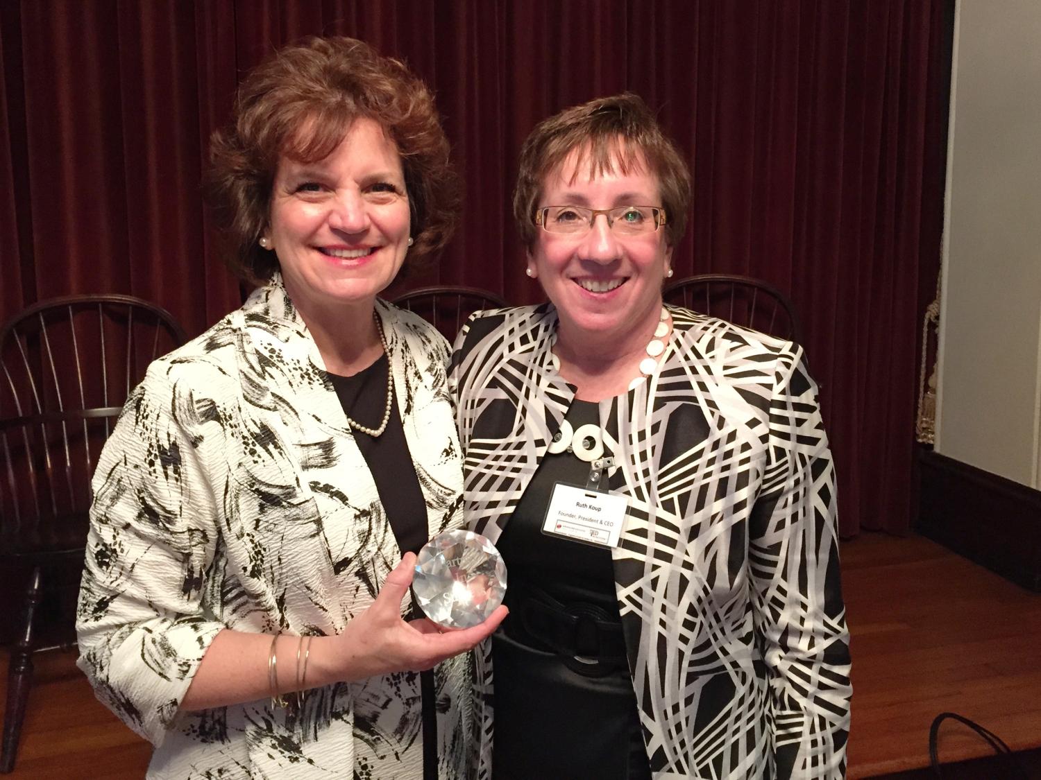 Ruth Koup presents the Partner in Success Award to Kathy Law.